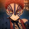 『鬼滅の刃 無限城編』に登場する上弦の参・猗窩座のアップ。不敵な笑みを浮かべる彼の正体や悲しい過去についての考察を深める一枚。